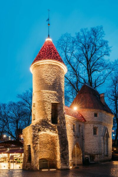 Tulsa Christmas Lights - A stone building lit up at night.