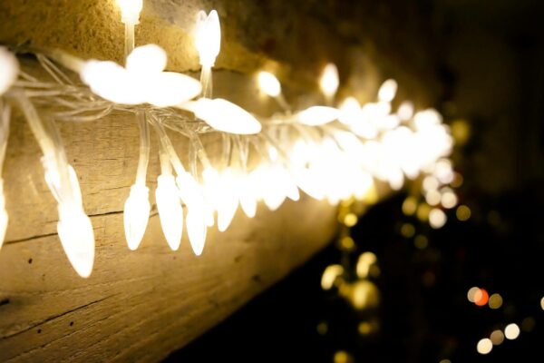 Tulsa Christmas Lights - A string of white lights hanging on a wall.